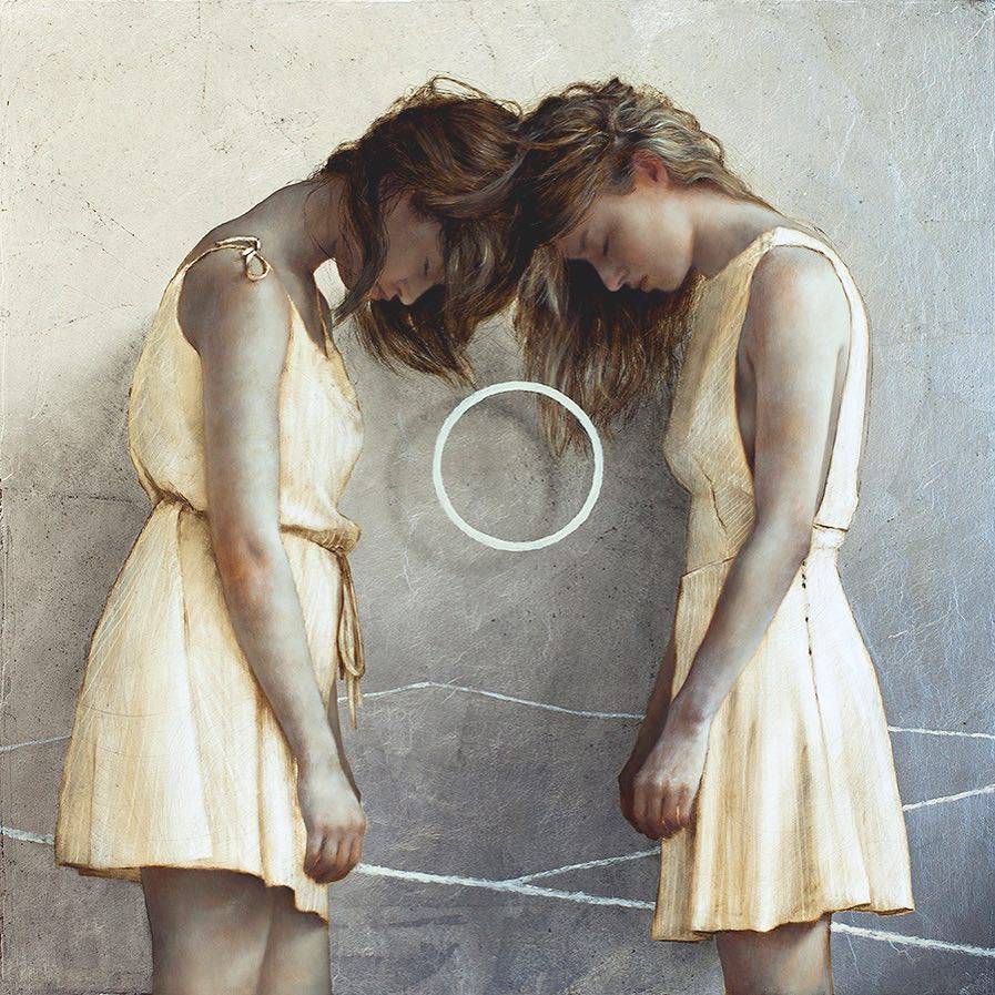 A painting of two figures in pale dresses leaning together, with a white ring on the wall between them.